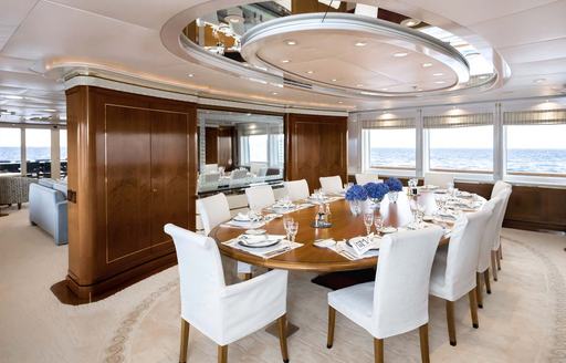 Interior dining area onboard charter yacht OLYMPUS