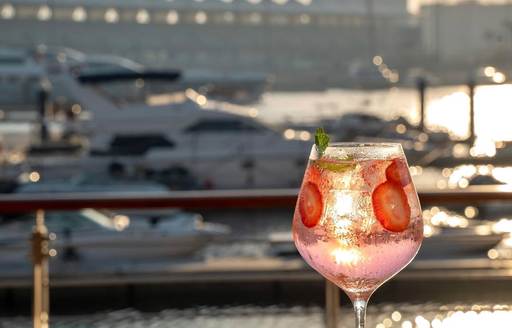 Mika Abu Dhabi drink, food, sea view
