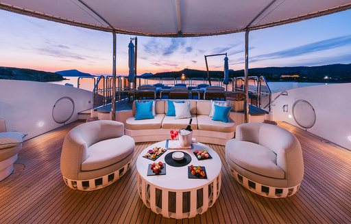 Exterior seating area onboard charter yacht IDYLLIC