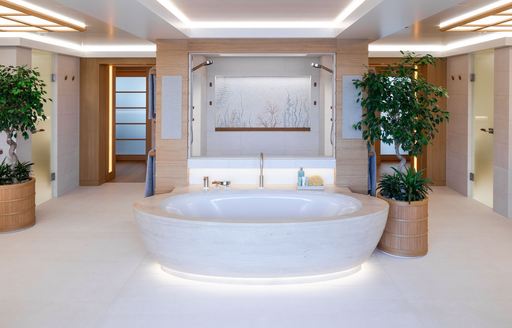 Ensuite facility onboard superyacht charter FLYING FOX with central bath tub