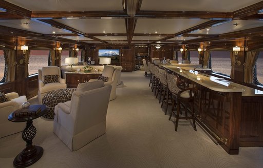 The traditional furnishings and fixtures in the main salon of superyacht Silver Lining