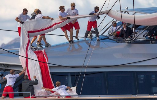 the crew at work on board charter yacht SEAHAWK during the Perini Navi Cup in Porto Cervo