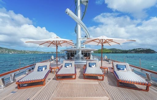 Charter yacht MALTESE FALCON sun loungers and two parasols