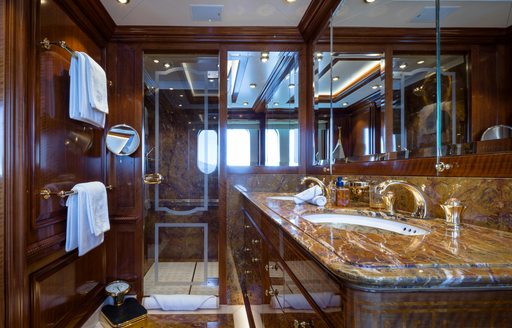 Ensuite with marble sink and separate shower cubicle onboard charter yacht STARFIRE