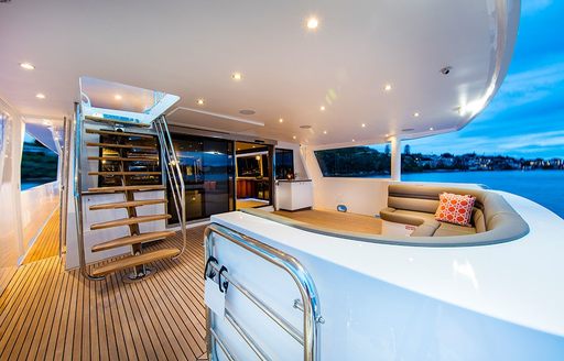 comfortable sofa on main deck aft of charter yacht CORROBOREE 