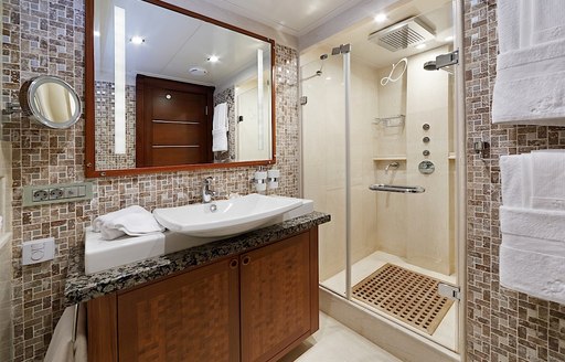 contemporary en suite bathroom in master suite aboard sailing yacht DAIMA