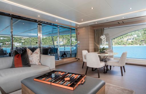 Charter yacht WABASH seating area and games table