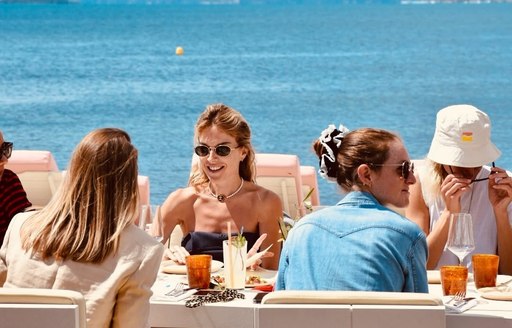 Charter guests at a table at Baba 