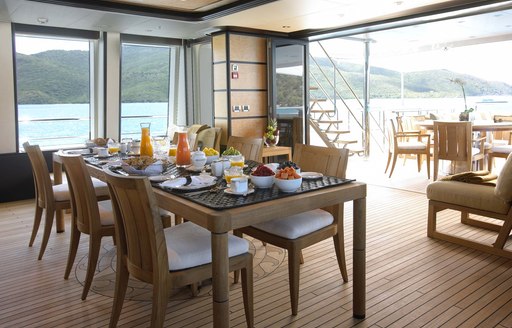 dinning in the bridge deck lounge on board motor yacht HARLE 