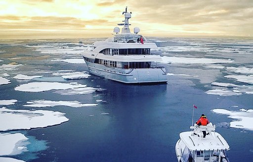 Superyacht LATITUDE underway as she cruise through the arctic surrounded by ice