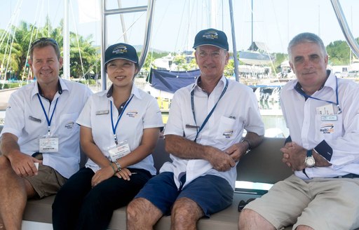 crew members prepare for the Phuket Boat Show held iin Phuket, Thailand