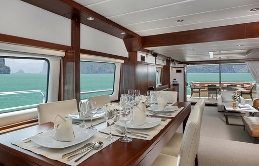 Interior dining arrangement on superyacht Mia Kai