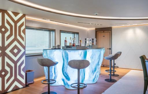 Charter yacht LA DATCHA interior wet bar and stools