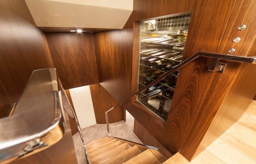 Charter yacht SEATALY stairwell with wine cellar
