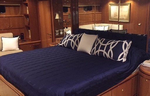 master suite with navy blue linen on board luxury yacht SANCTUARY 