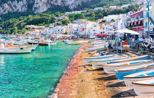 boats on the water at the marina in capri