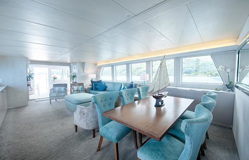 interior dining on main deck of luxury yacht DREAMTIME 