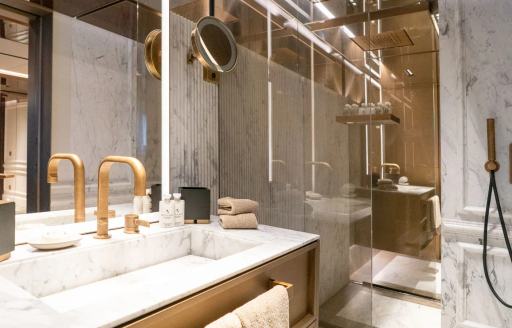 Ensuite with shower cubicle and sink unit onboard charter yacht RAJA²