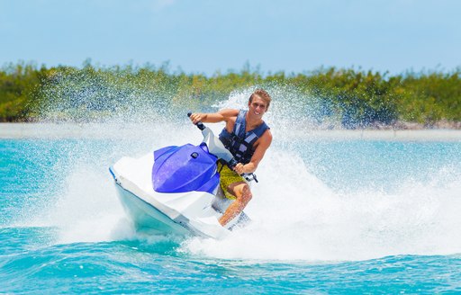 A man riding on a jetski