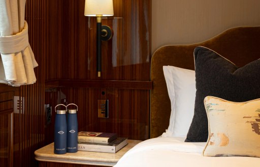 Charter yacht AQUA LARES bedside table in guest cabin
