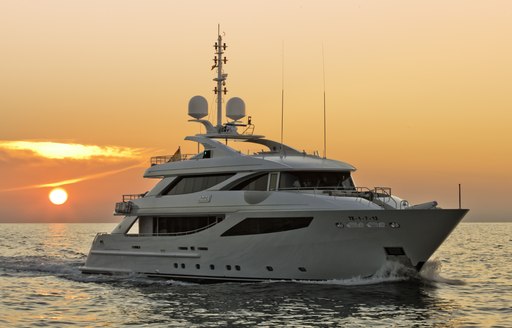 motor yacht AZIZA cruising at sunset in the Mediterranean