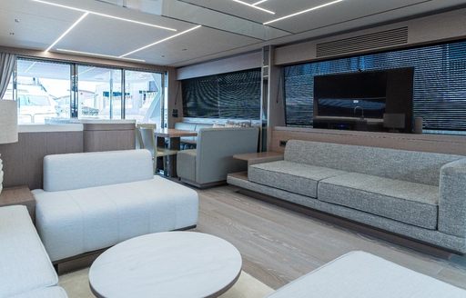 Charter yacht ASCEND interior lounge and wall-mounted TV