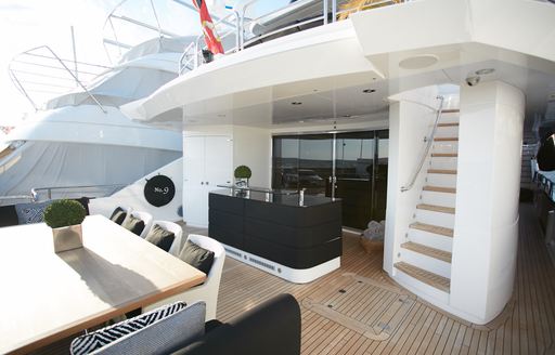 No. 9 of London aft deck seating area and wet bar area