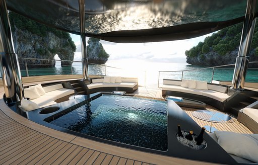 Overview of a deck Jacuzzi and adjacent seating onboard charter yacht SEAWOLF X