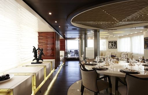 beautifully styled formal dining area aboard superyacht E&E 