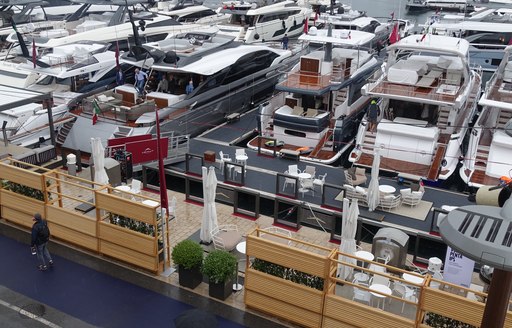 Yachts lined up along the harbour at Monaco Yacht Show 2019