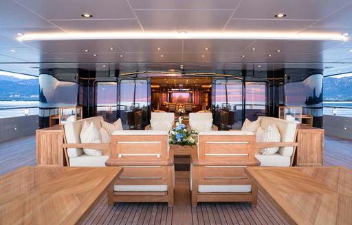 Exteriors and wooden seating onboard charter yacht STARFIRE 