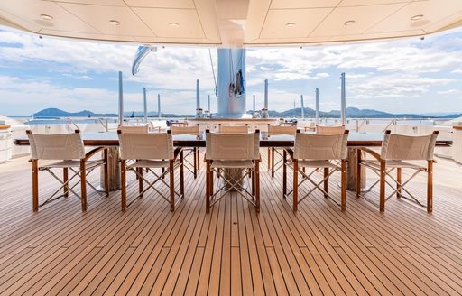 Charter yacht BLACK PEARL alfresco dining table and chairs