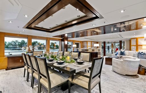 Charter yacht NOVERRA interior dining area and large windows