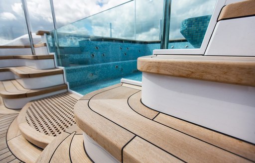 A detail shot of the teak decking on superyacht AQUILA