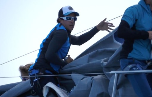 Sailor on board yacht at regatta in Sardinia