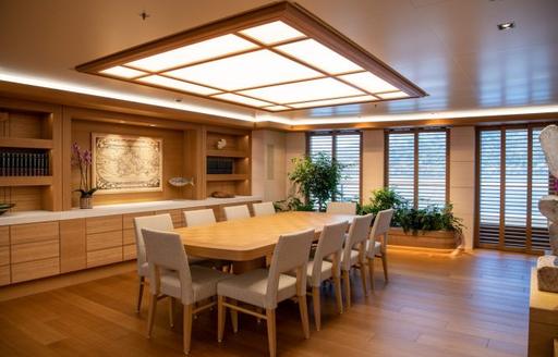 Interior dining area onboard charter yacht FLYING FOX
