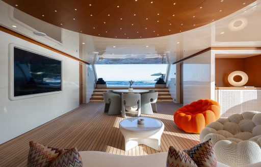 Interior view of the beach club onboard charter yacht LADY A