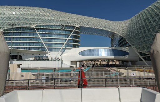 view of Abu Dhabi Grand Prix from the main deck aft of luxury superyacht on the qualifying day of the race