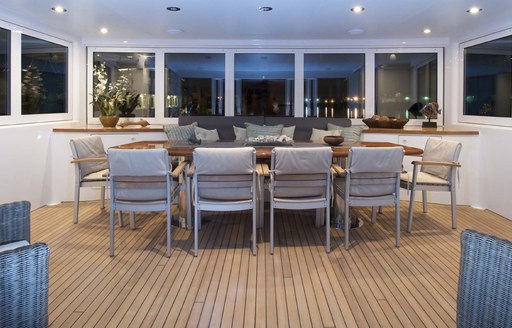 Charter guests can enjoy al fresco dining together on board M/Y AlumerciA