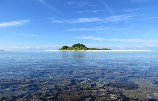 view from afar of Haa Alif Atoll in the Maldives