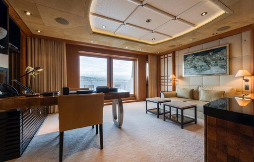 Private study area on Superyacht SUNRAYS with glass doors to outside