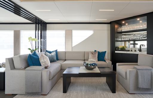 Charter yacht CYNDERELLA interior lounge area with plush seating
