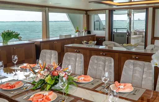 Formal dining area on motor yacht ENTREPRENEUR