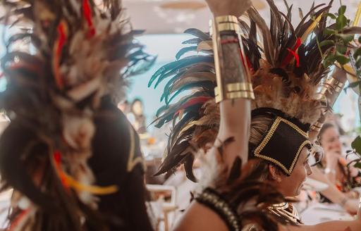 Dancers in costume at Nao Beach
