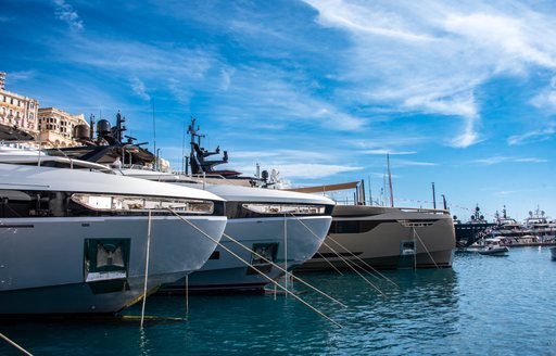 Superyacht charters berthed in a line