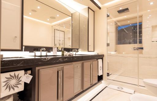 Ensuite facility with shower cubicle and large sink unit onboard charter yacht LUNA