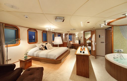 expansive master suite with private Jacuzzi aboard superyacht SHERAKHAN 