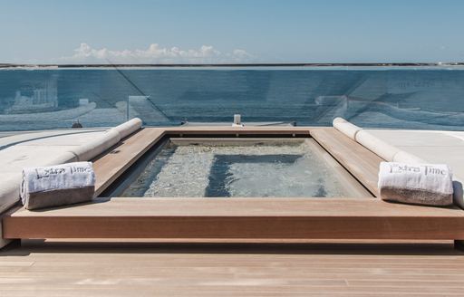 Swimming pool onboard superyacht charter EXTRA TIME