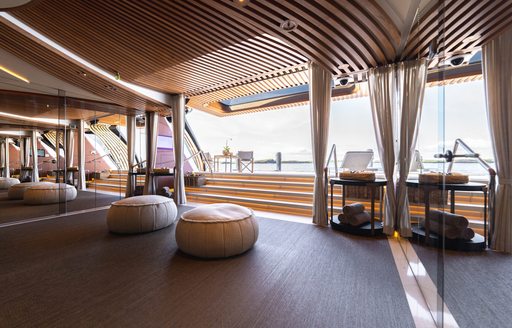 Interior of beach club with access to amenities onboard charter yacht KISMET