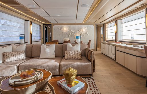 Charter yacht HAZE² interior lounge with brown sofas